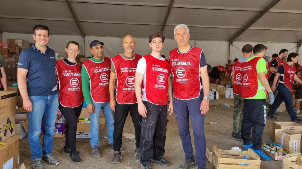 Our CEO and some employees during the post-flood relief in Faenza